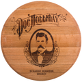A round wooden barrel head or cask lid with a natural brown wood grain finish, featuring a laser-engraved portrait of a man with a mustache and the text 'Doc Holliday and 'STRAIGHT BOURBON WHISKEY'.