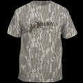 A short-sleeve crewneck t-shirt featuring a gray and beige bark camouflage pattern, with a distressed black graphic on the chest that reads 'Doc Holliday'.